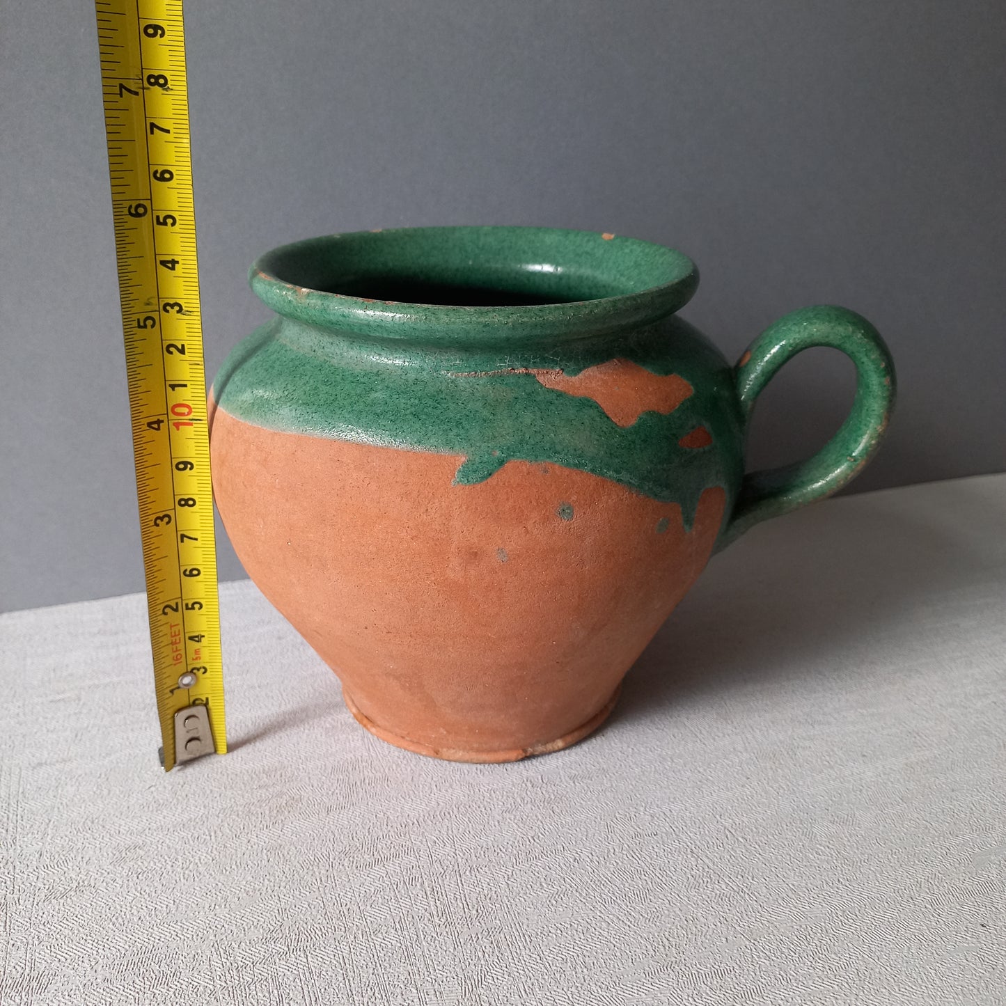 Small French vintage pottery jug with green glazed interior
