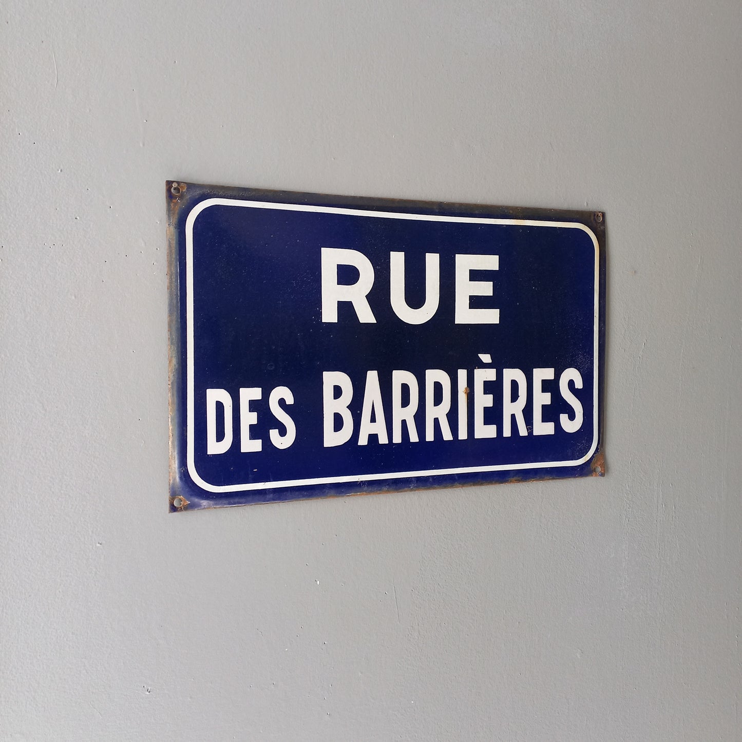 Original and very collectible, a French street name sign, 'Rue des Barrières' sauced at an antique market in south west France. These old dark blue (it's a darker blue than it appears in my photos) street signs with white text look super as pieces of home decor in French country home/shabby chic inspired interiors, man caves, commercial premises, industrial loft apartments, and many other locations.