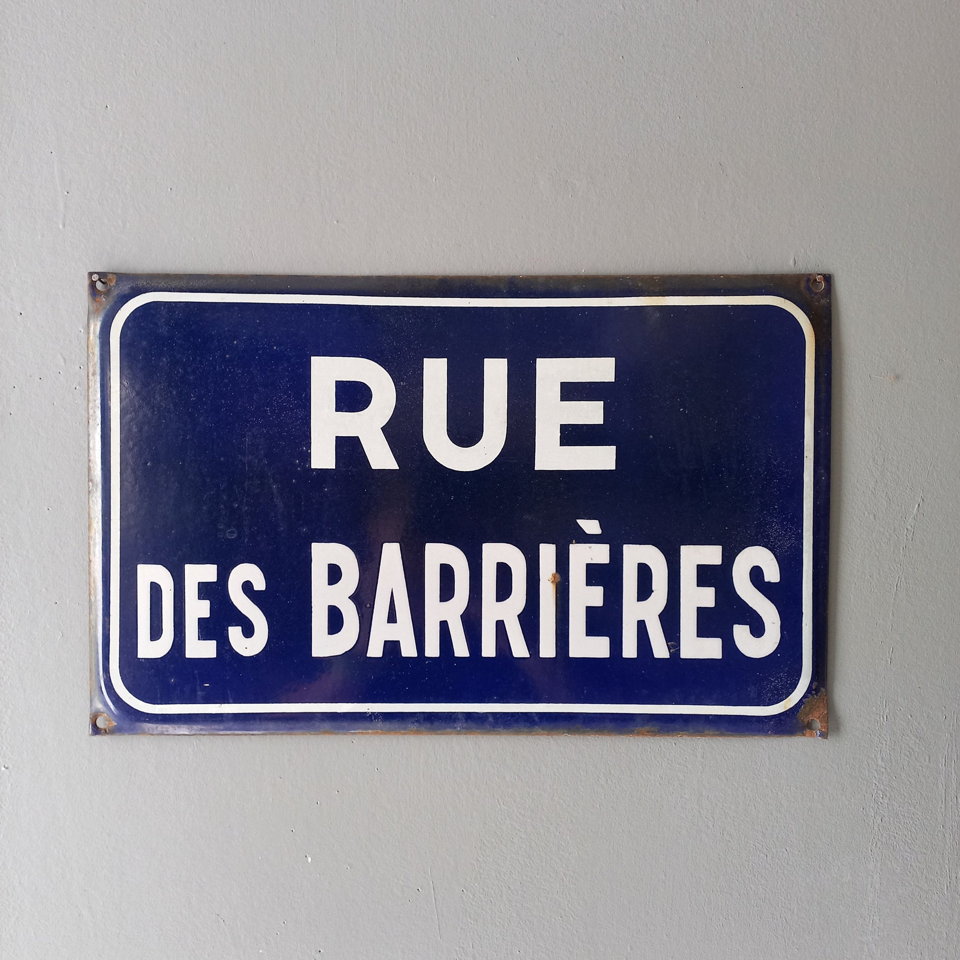 Original and very collectible, a French street name sign, 'Rue des Barrières' sauced at an antique market in south west France. These old dark blue (it's a darker blue than it appears in my photos) street signs with white text look super as pieces of home decor in French country home/shabby chic inspired interiors, man caves, commercial premises, industrial loft apartments, and many other locations.