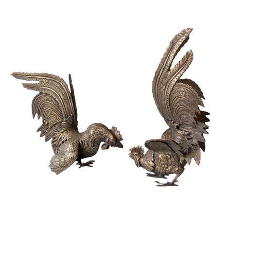 Pair of large French vintage fighting cockerels, highly decorative, quality pieces with a lot of weight to them. Traditionally used as dinner table centerpieces although these days also suitable for mantelpiece, shelf and desk decor. We have given these birds only a minor cleaning.