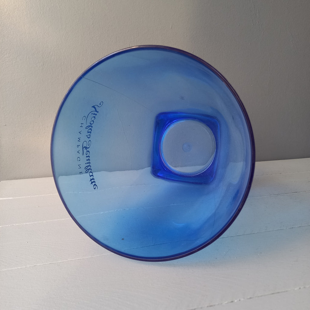 Vintage Nicolas Feuillatte transparent blue champagne bucket made from resin or hardened plastic. Being a vintage item there are of course some scuffs and scratches in the plastic.