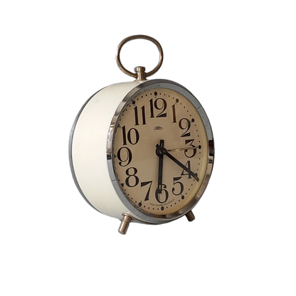 white vintage alarm clock, retro mechanical clock, bedside or nightstand ticking clock