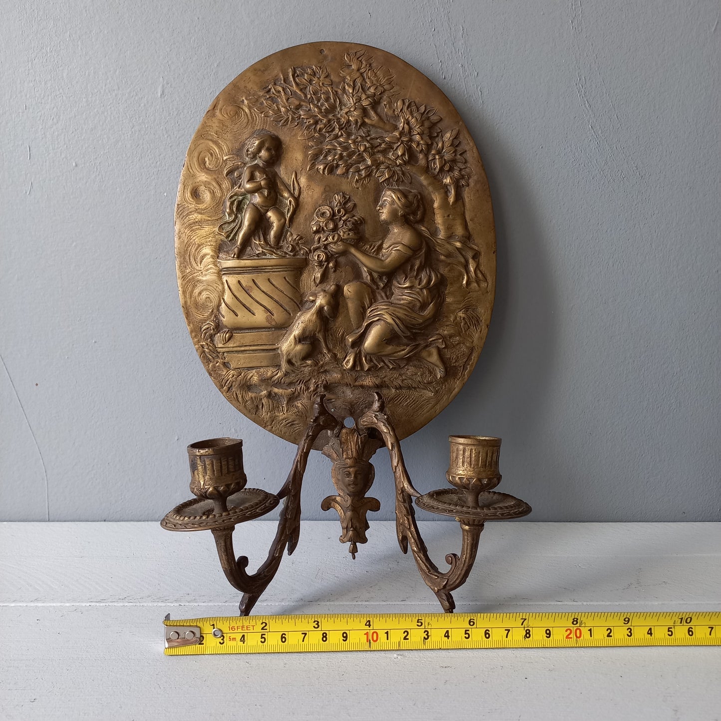 Antique wall mounted decorative candle sconce