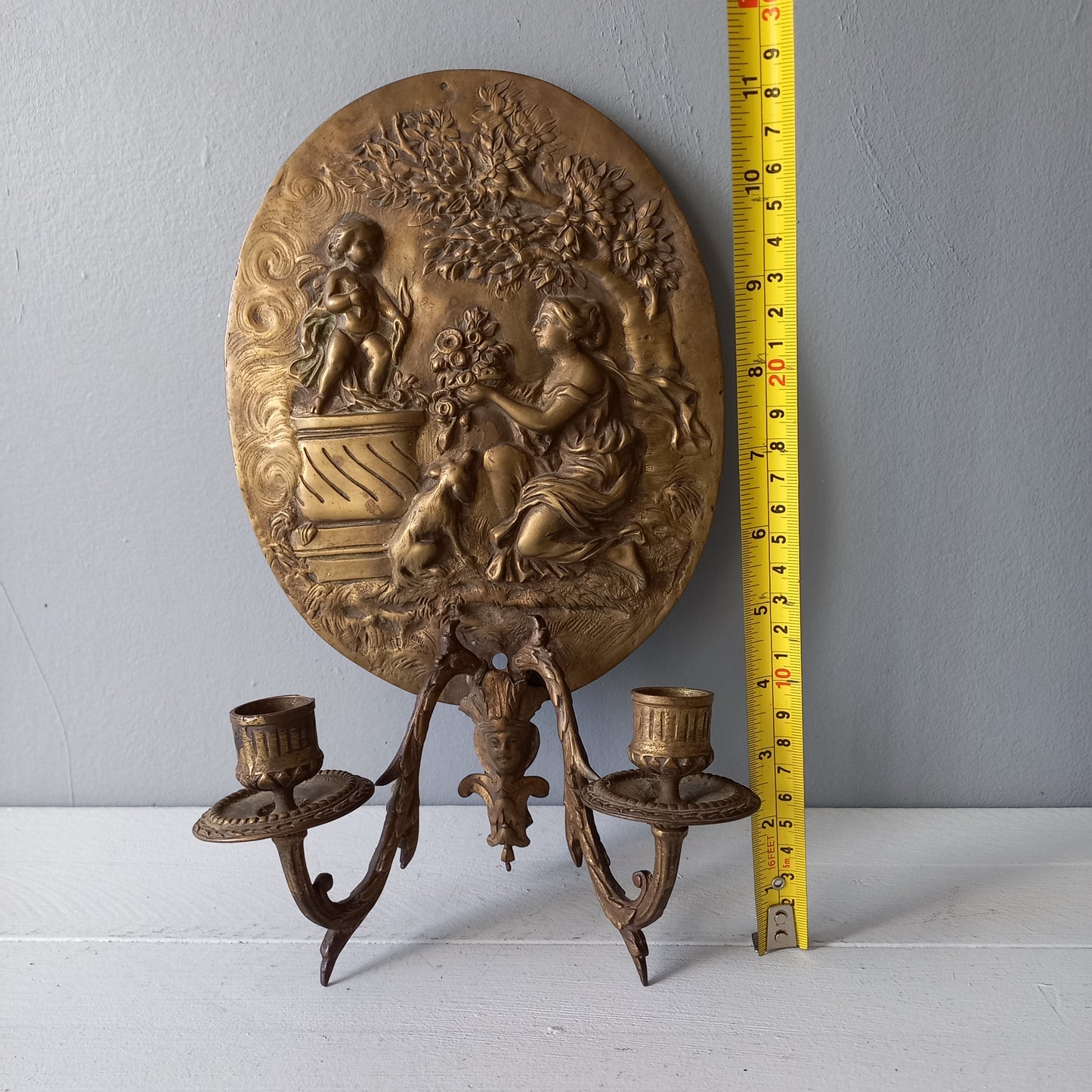 Antique wall mounted decorative candle sconce