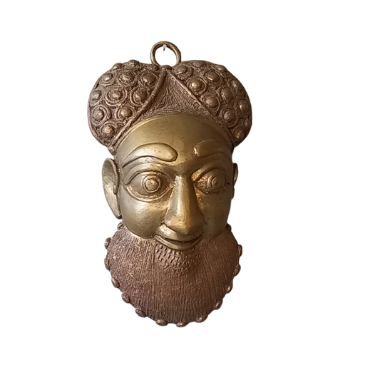 An interesting little vintage tribal mask I purchased in France. It's a heavy, quality piece made from a brass-coated metal and would look great in an ethic mask collection or as a stand alone piece of wall decor.