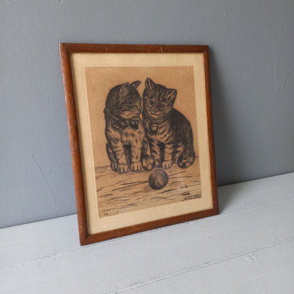 A French vintage drawing of two cute cats or kittens who look like they're planning to be naughty with their owner's ball of wool, a naive piece of art although none-the-less very charming indeed. It appears to be an original drawing, although I haven't opened up the back as it's well sealed with the original French framer's label. The drawing has been signed by the artist.