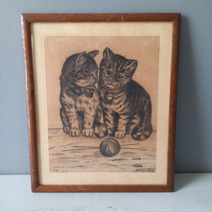 A French vintage drawing of two cute cats or kittens who look like they're planning to be naughty with their owner's ball of wool, a naive piece of art although none-the-less very charming indeed. It appears to be an original drawing, although I haven't opened up the back as it's well sealed with the original French framer's label. The drawing has been signed by the artist.