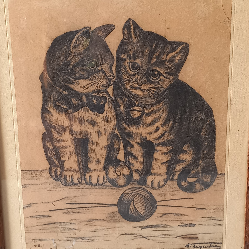 A French vintage drawing of two cute cats or kittens who look like they're planning to be naughty with their owner's ball of wool, a naive piece of art although none-the-less very charming indeed. It appears to be an original drawing, although I haven't opened up the back as it's well sealed with the original French framer's label. The drawing has been signed by the artist.