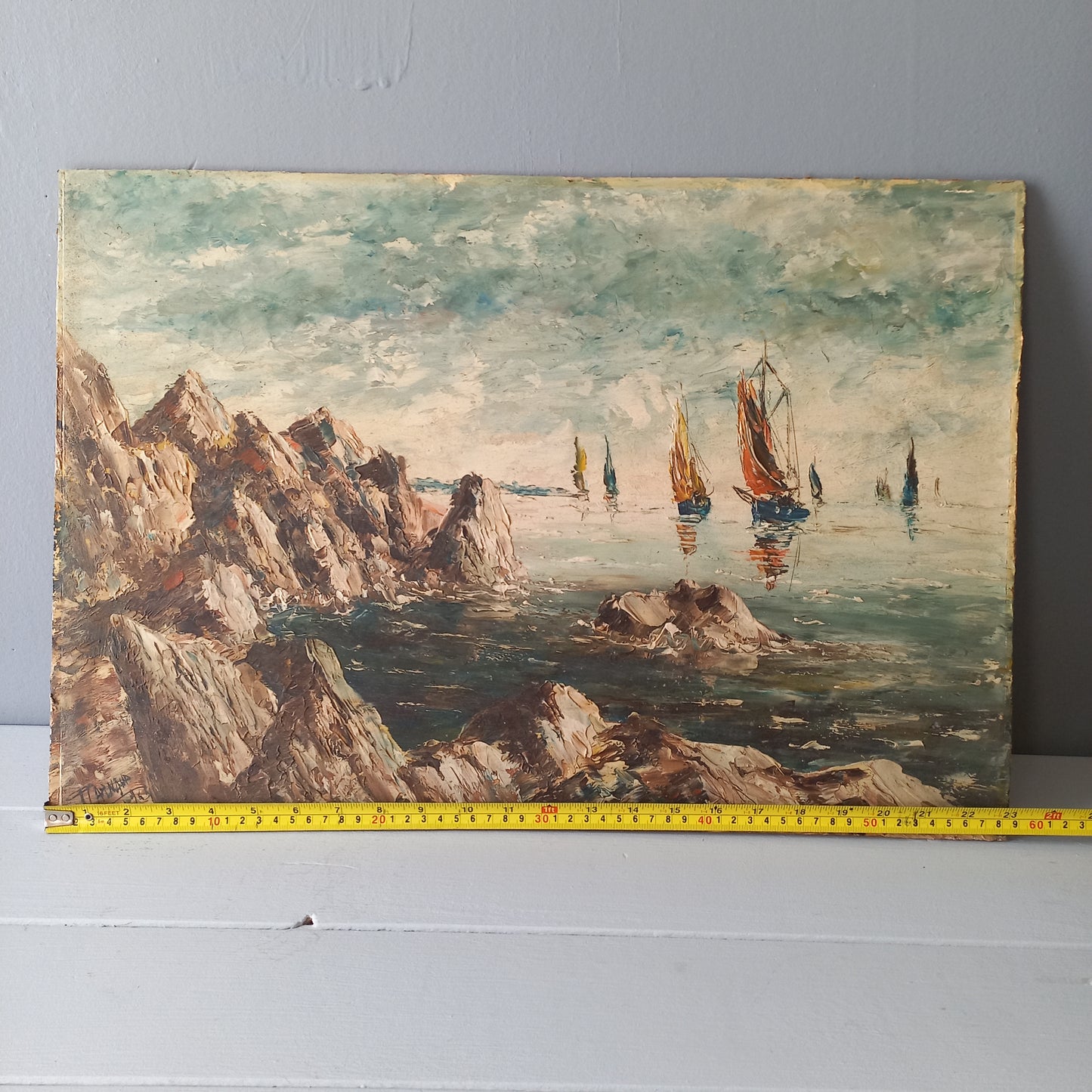 A beautiful piece of original French art depicting sailing boats on a rocky coastline. The painting is wonderfully done in a 'painterly' fashion with thick, vibrant oil paint strokes on hardboard. It has been signed and dated by the artist.