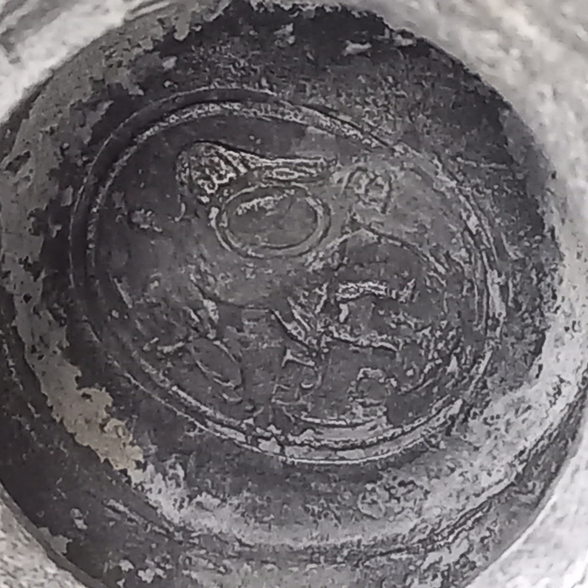 Maker's mark under a large French antique decorative pewter jug