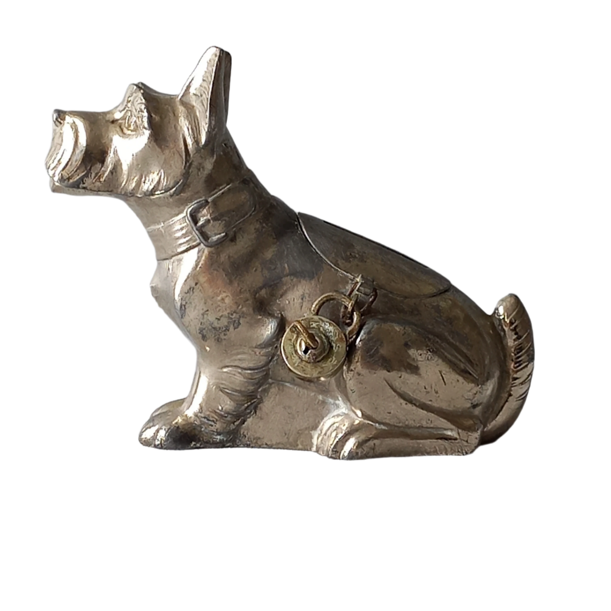 A fabulous French art deco metal terrier dog money box/coin storage box complete with a little padlock and key which still work. 

This unique piece of history was purchased in south west France and we can only imagine who once owned it and what they might have saved their coins to buy.
