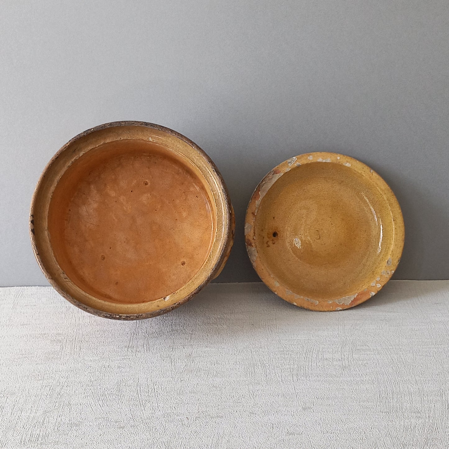 Antique casserole dish from France, ochre stoneware terrine