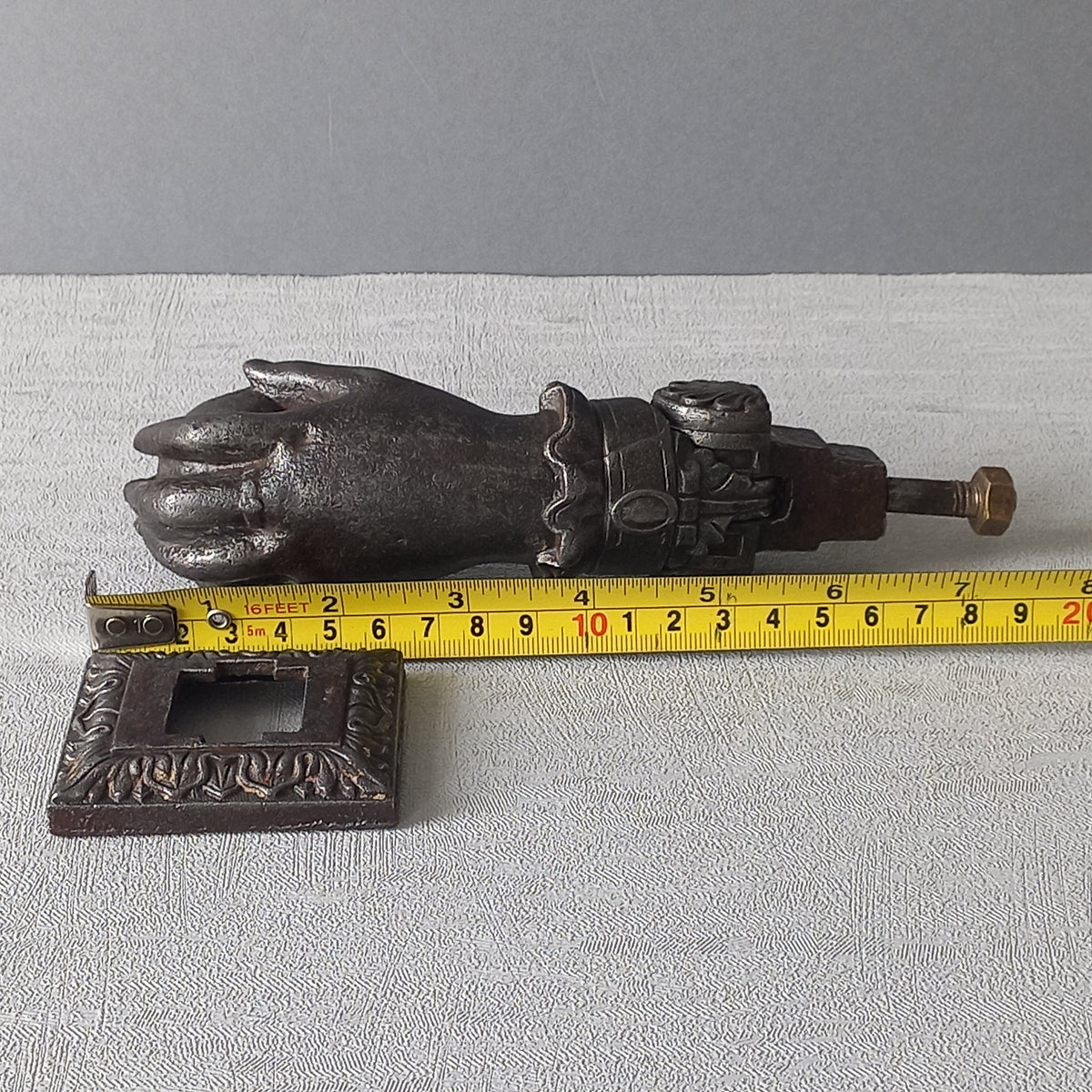 French antique female hand door knocker made from cast iron