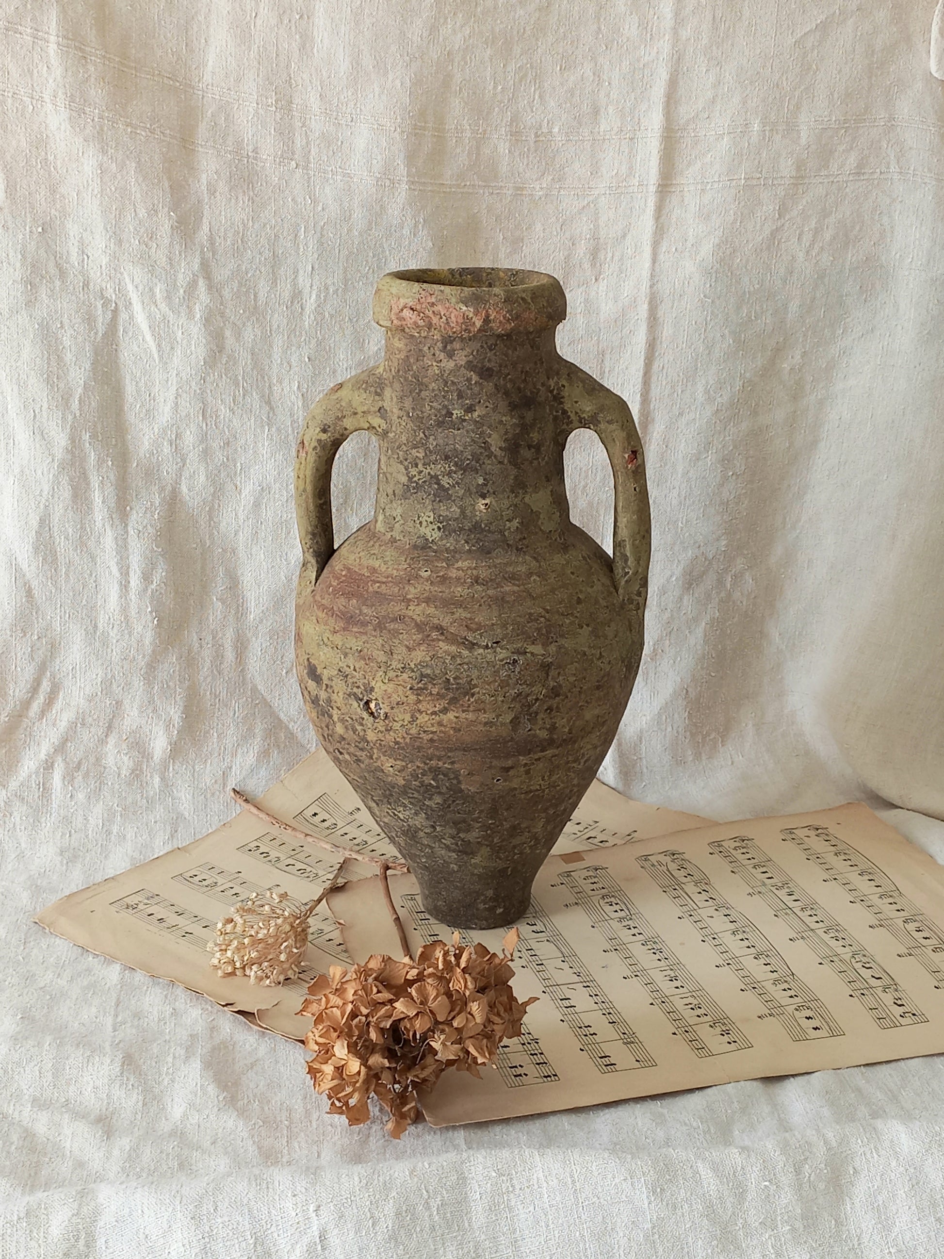 antique hand-made terracotta stoneware storage pot. With its ancient Greek inspired lines and rough texture it would make a absolutely beautiful piece of home decor in a rustic, farmhouse or country-inspired interior.