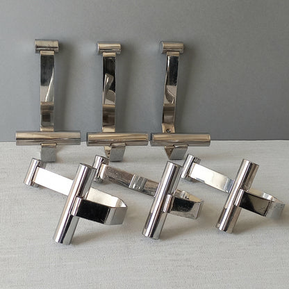 Set of 6 French vintage mid-century coat and hat hooks made from polished metal that can be simply fitted to your wall using the mounting holes.