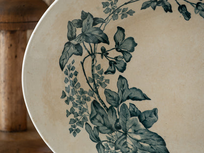 An absolutely stunning large French antique oval ironstone serving plate in a delightful time-worn creamy white with blue transferware pattern depicting two cute birds and flowers. 