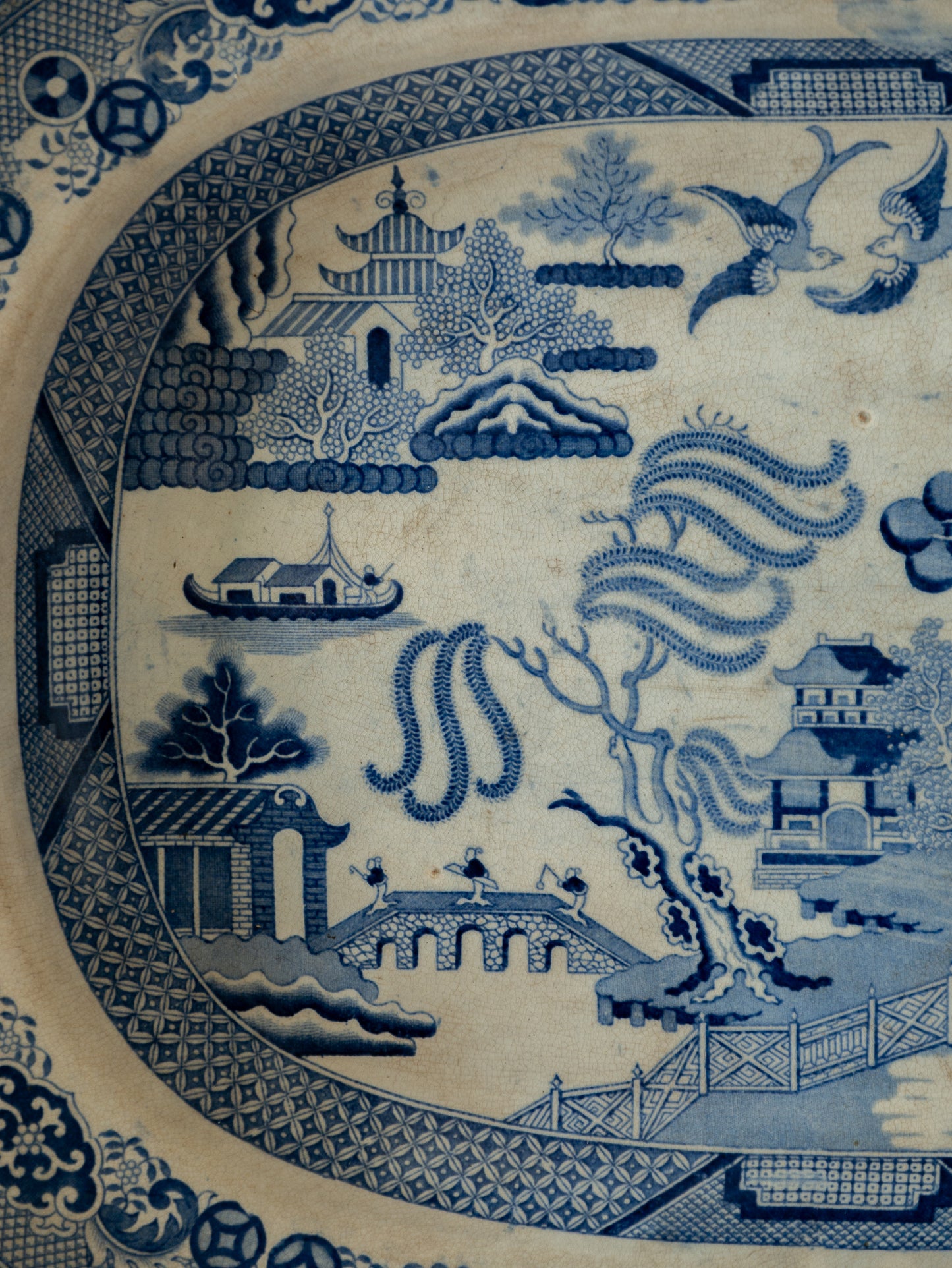 Blue and white ceramic plate with scenic design