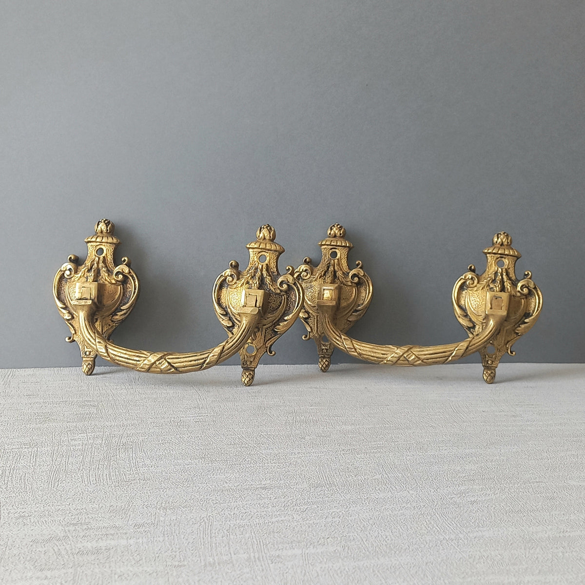 A pair of stunning French antique bronze drawer handles, elegant and decorative pieces to add the finishing touches to your drawers.