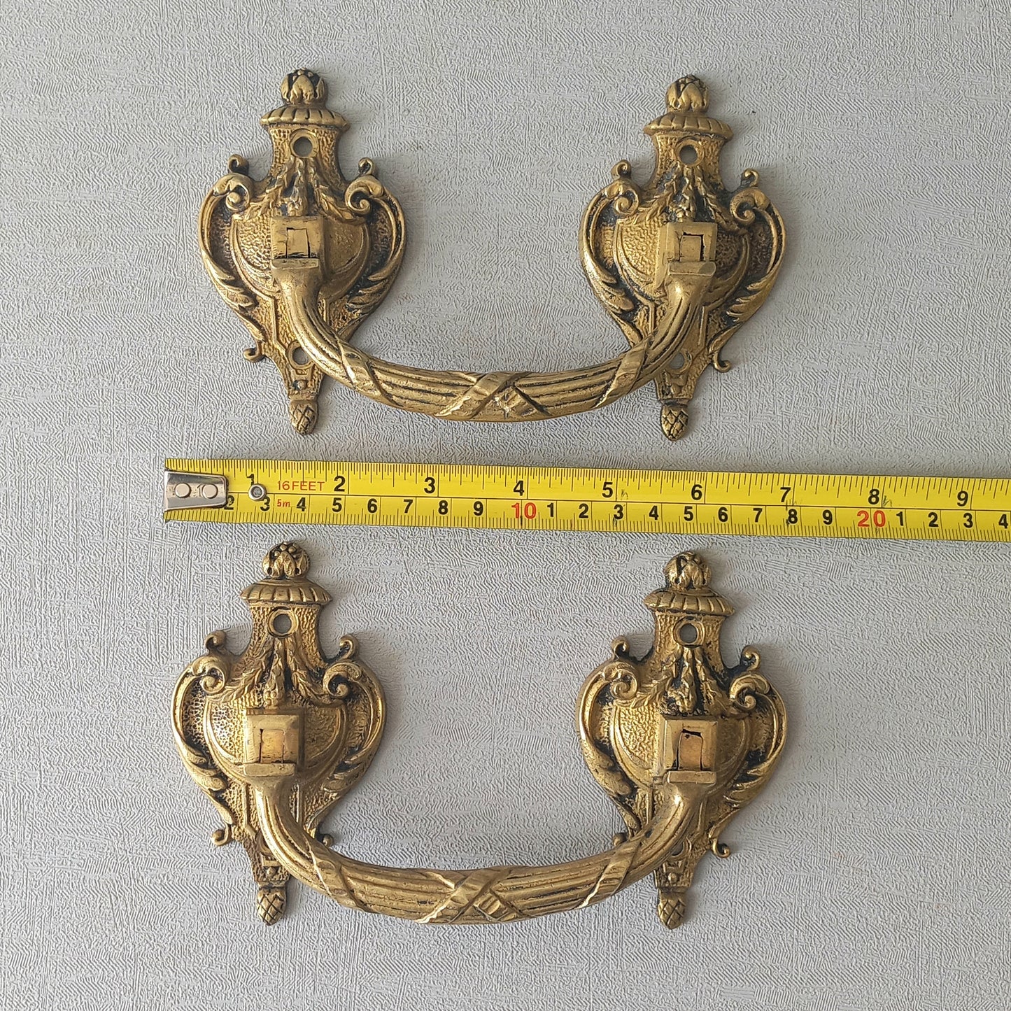 A pair of stunning French antique bronze drawer handles, elegant and decorative pieces to add the finishing touches to your drawers.