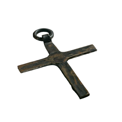 An interesting French antique artisan made Crucifix made from iron and painted black. On one side the metal has worn away in places giving this piece a pleasing patina of age. There's a hanging loop so it's ready to hang in your home.

We guesstimate this piece to be over 100 years old.
