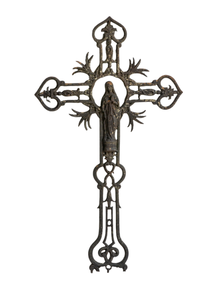 A large French antique crucifix in cast or wrought iron, featuring a figure of the Madonna at its center. Likely once part of a larger architectural structure, this rare piece carries visible signs of age and long exposure to the elements.