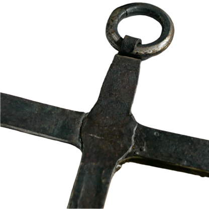An interesting French antique artisan made Crucifix made from iron and painted black. On one side the metal has worn away in places giving this piece a pleasing patina of age. There's a hanging loop so it's ready to hang in your home.

We guesstimate this piece to be over 100 years old.