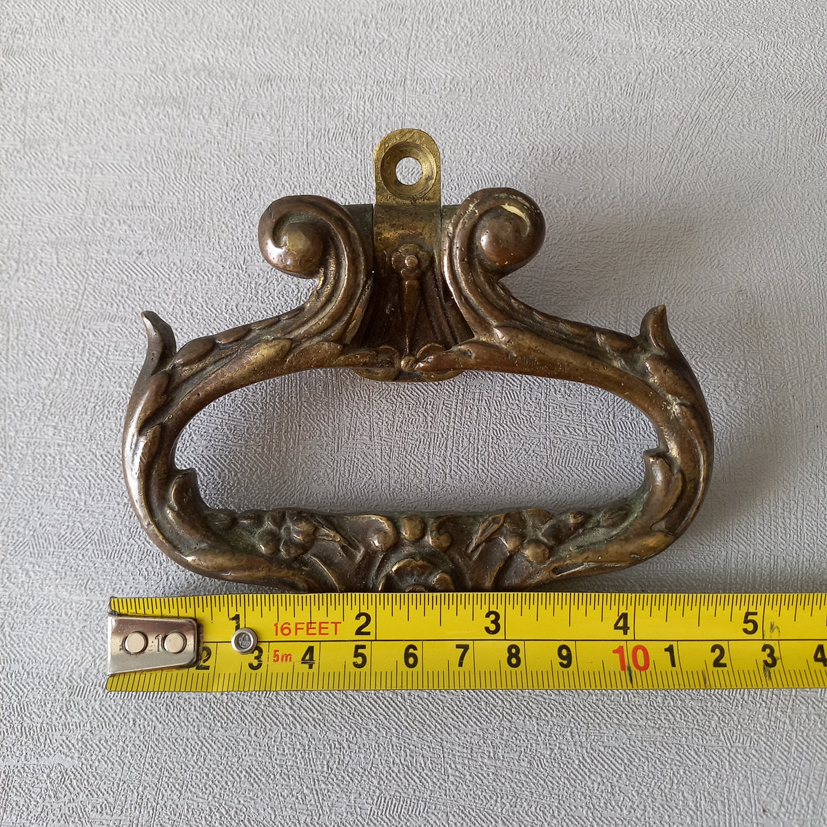 A stunning pair of French antique highly decorative bronze/brass drawer handles that have the maker's numbers to the rear, and are heavy, quality pieces that will be the wonderful finishing touch to a piece of furniture.