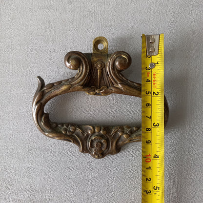 A stunning pair of French antique highly decorative bronze/brass drawer handles that have the maker's numbers to the rear, and are heavy, quality pieces that will be the wonderful finishing touch to a piece of furniture.