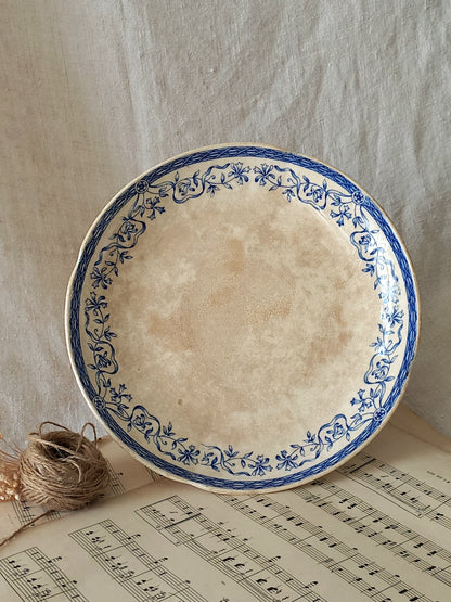 A beautiful French antique footed dish/cake stand with a striking dark blue floral pattern made by premier manufacturer Sarreguemines.
