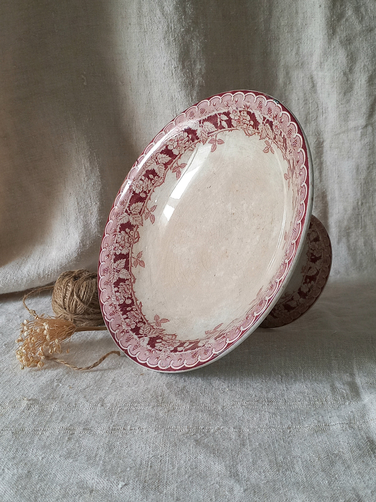 French antique ironstone/earthenware white patinated footed-dish with a pretty burgandy colour floral pattern