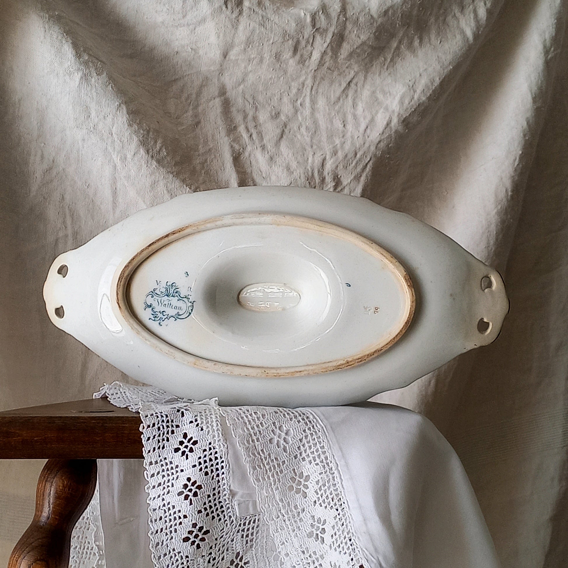 A large and elegant antique ironstone sauce boat with a green floral transferware pattern, a grand-looking, heavy piece. These days this piece will make an excellent piece of decor in any home, especially those of a country or farmhouse nature.
