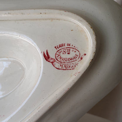 A beautiful French antique white ironstone gravy boat with a pretty pink floral transferware pattern, a heavy and quality piece manufactured by St. Amand. A great piece of decor in any home, and especially those of a rustic, country or farmhouse nature.