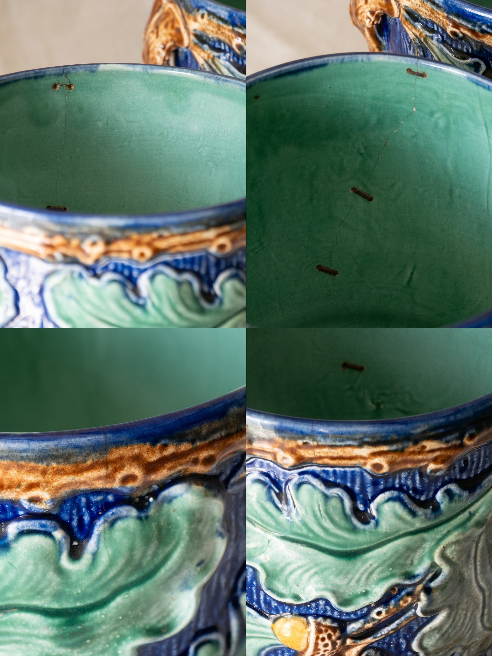 A stunning pair of French antique majolica planters, absolutely glorious fresh blue and green colours with oak leafs and acorns in relief making these stunning pieces of interior home decor wherever you decide to display them.

One of the planters has an antique repair in the form of metal staples that have been expertly done from the inside - in the 1800s and early 1900s this was quite a common repair to have made on items of high value and we feel it only adds to the authenticity/story of these pieces.