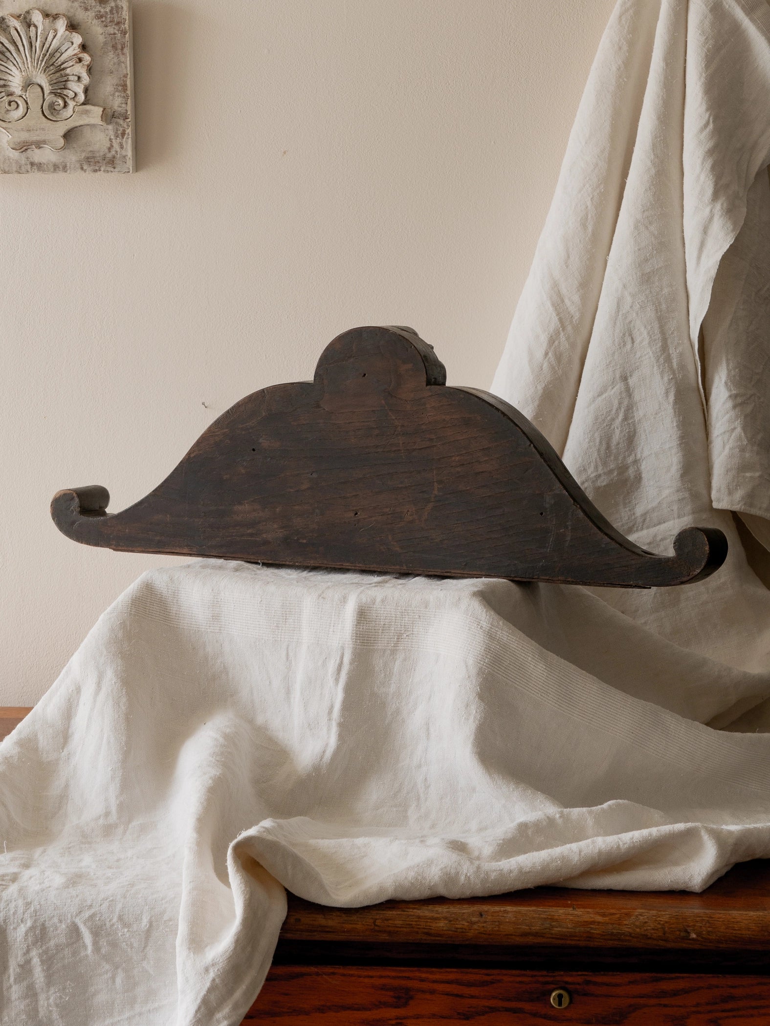 A stunning French antique carved dark wooden furniture pediment highly decorative and expertly crafted by a carpenter - this is a very heavy, quality piece and will look fabulous in any interior.