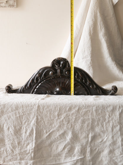 A stunning French antique carved dark wooden furniture pediment highly decorative and expertly crafted by a carpenter - this is a very heavy, quality piece and will look fabulous in any interior.