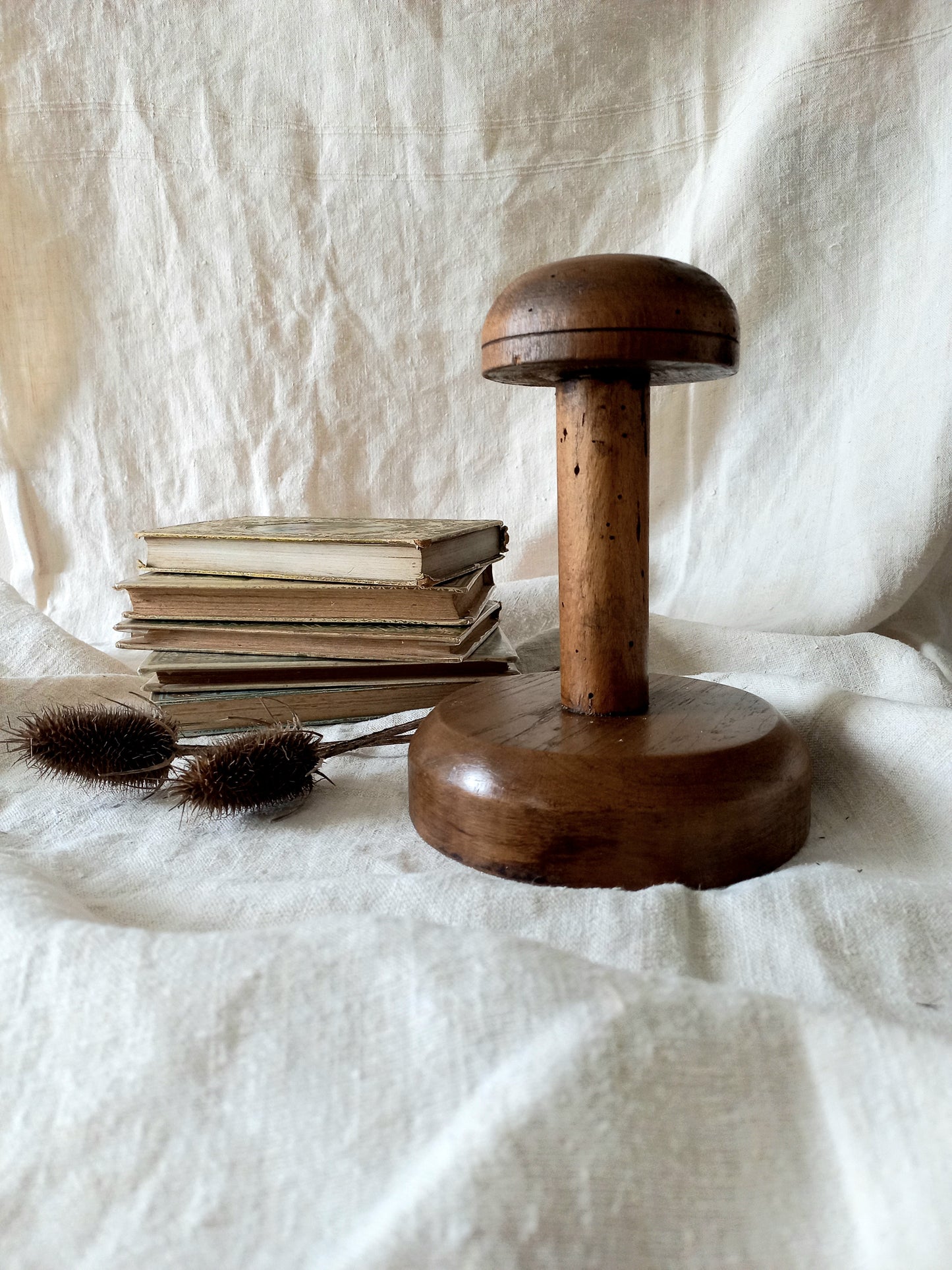 A beautiful French vintage/antique wooden hat stand/milliner's stand. This hand-made hat stand is a short, solid and sturdy piece with some good weight to it that will make a great piece of home decor in any interior, especially those inspired by rustic, country and farmhouse decor.