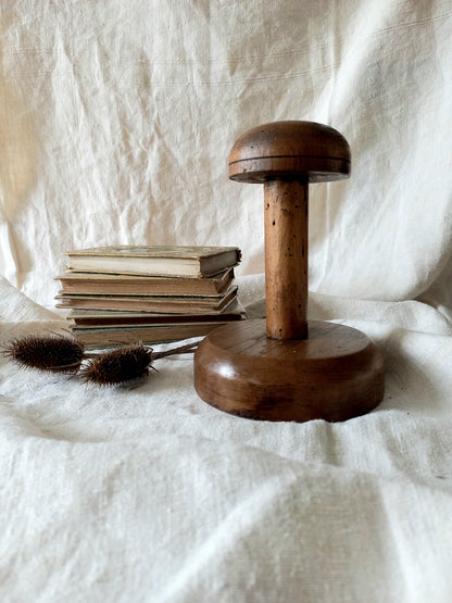 A beautiful French vintage/antique wooden hat stand/milliner's stand. This hand-made hat stand is a short, solid and sturdy piece with some good weight to it that will make a great piece of home decor in any interior, especially those inspired by rustic, country and farmhouse decor.