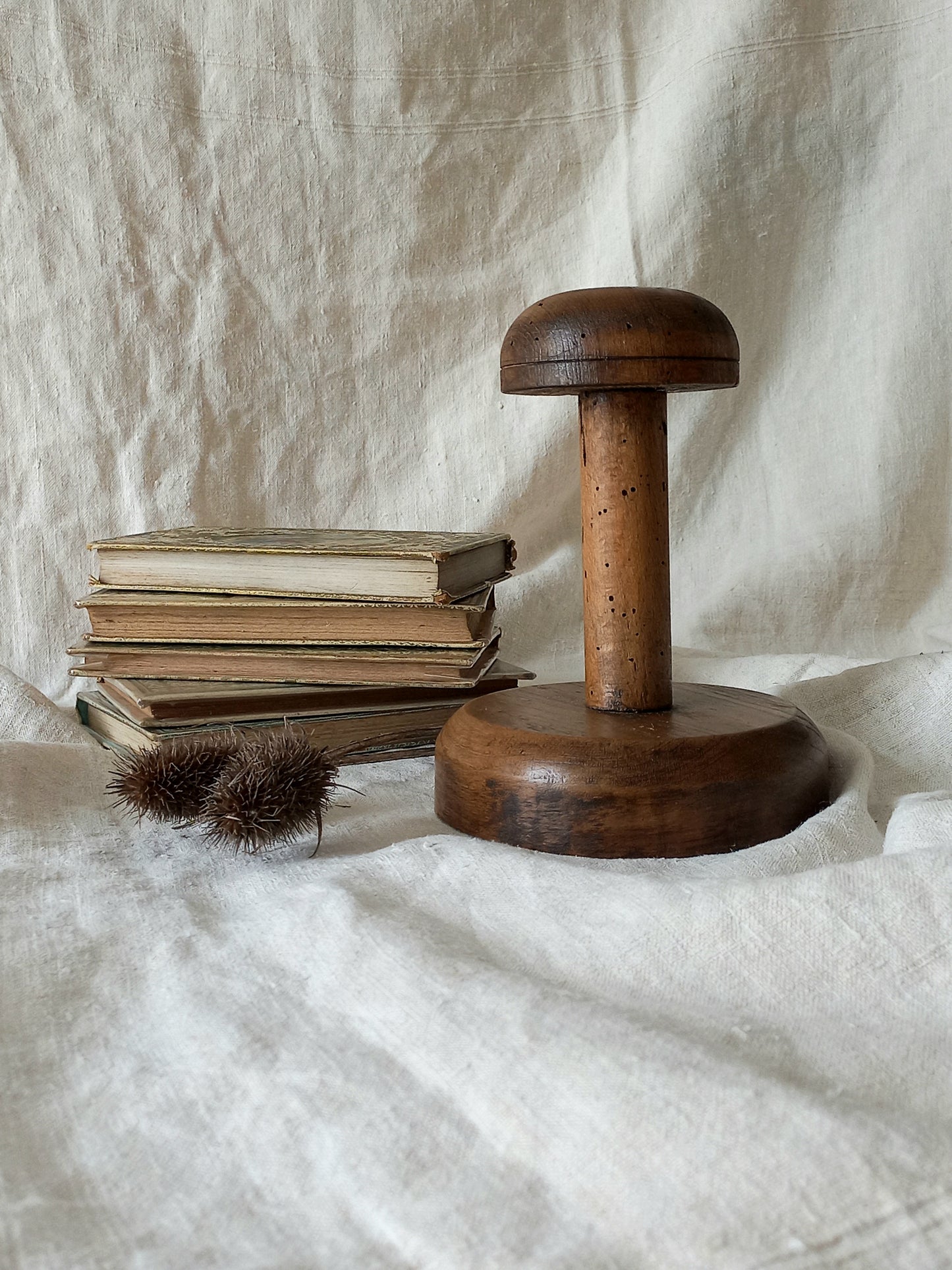 A beautiful French vintage/antique wooden hat stand/milliner's stand. This hand-made hat stand is a short, solid and sturdy piece with some good weight to it that will make a great piece of home decor in any interior, especially those inspired by rustic, country and farmhouse decor.