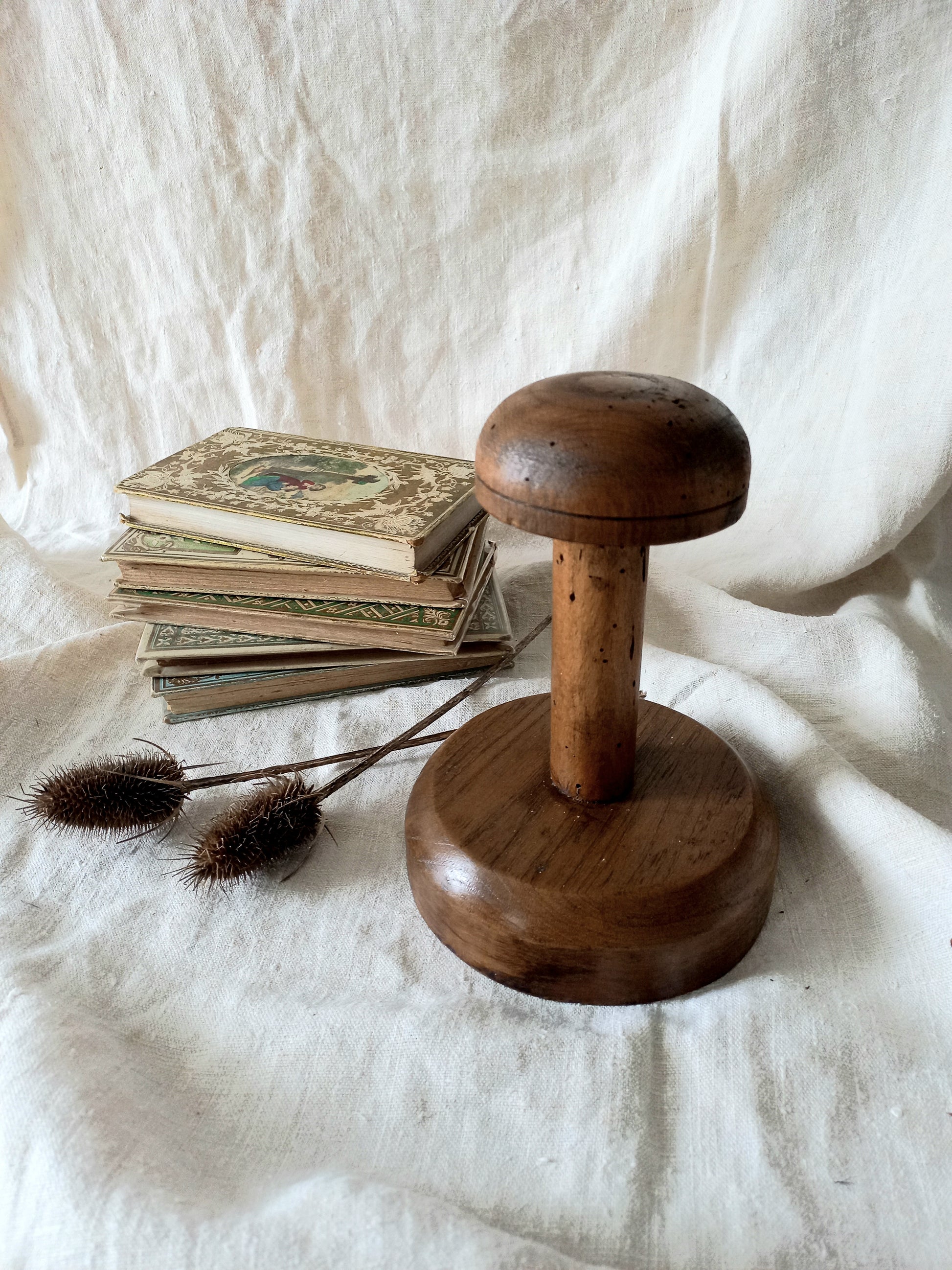 A beautiful French vintage/antique wooden hat stand/milliner's stand. This hand-made hat stand is a short, solid and sturdy piece with some good weight to it that will make a great piece of home decor in any interior, especially those inspired by rustic, country and farmhouse decor.