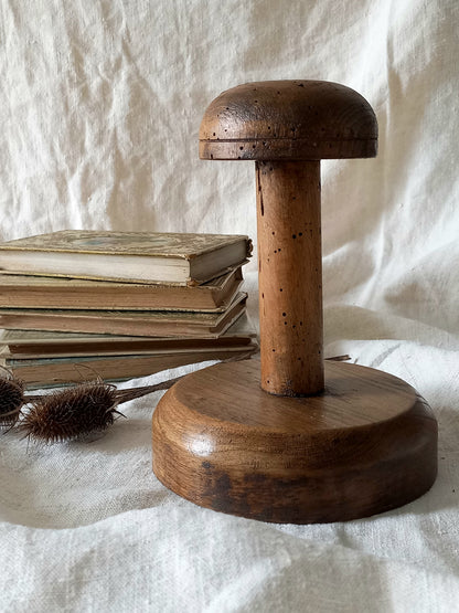 A beautiful French vintage/antique wooden hat stand/milliner's stand. This hand-made hat stand is a short, solid and sturdy piece with some good weight to it that will make a great piece of home decor in any interior, especially those inspired by rustic, country and farmhouse decor.