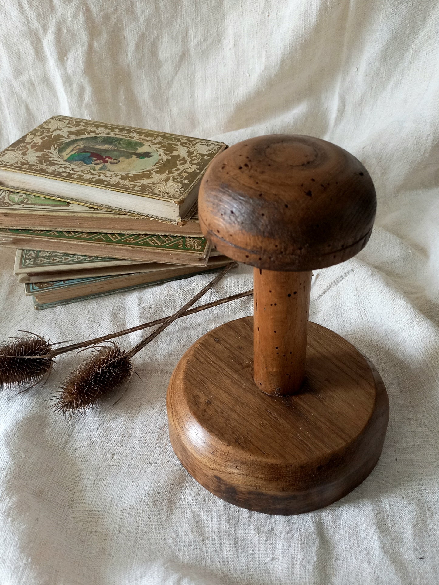 A beautiful French vintage/antique wooden hat stand/milliner's stand. This hand-made hat stand is a short, solid and sturdy piece with some good weight to it that will make a great piece of home decor in any interior, especially those inspired by rustic, country and farmhouse decor.