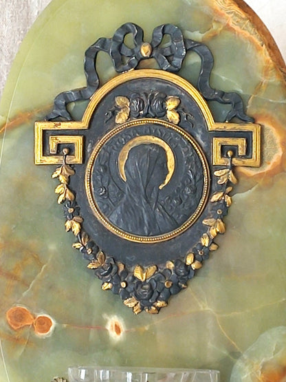 French antique Holy Water font made from onyx with intricate decorative detailing made from metal, a glass water font , and a brass back-plate with a hanging hook.