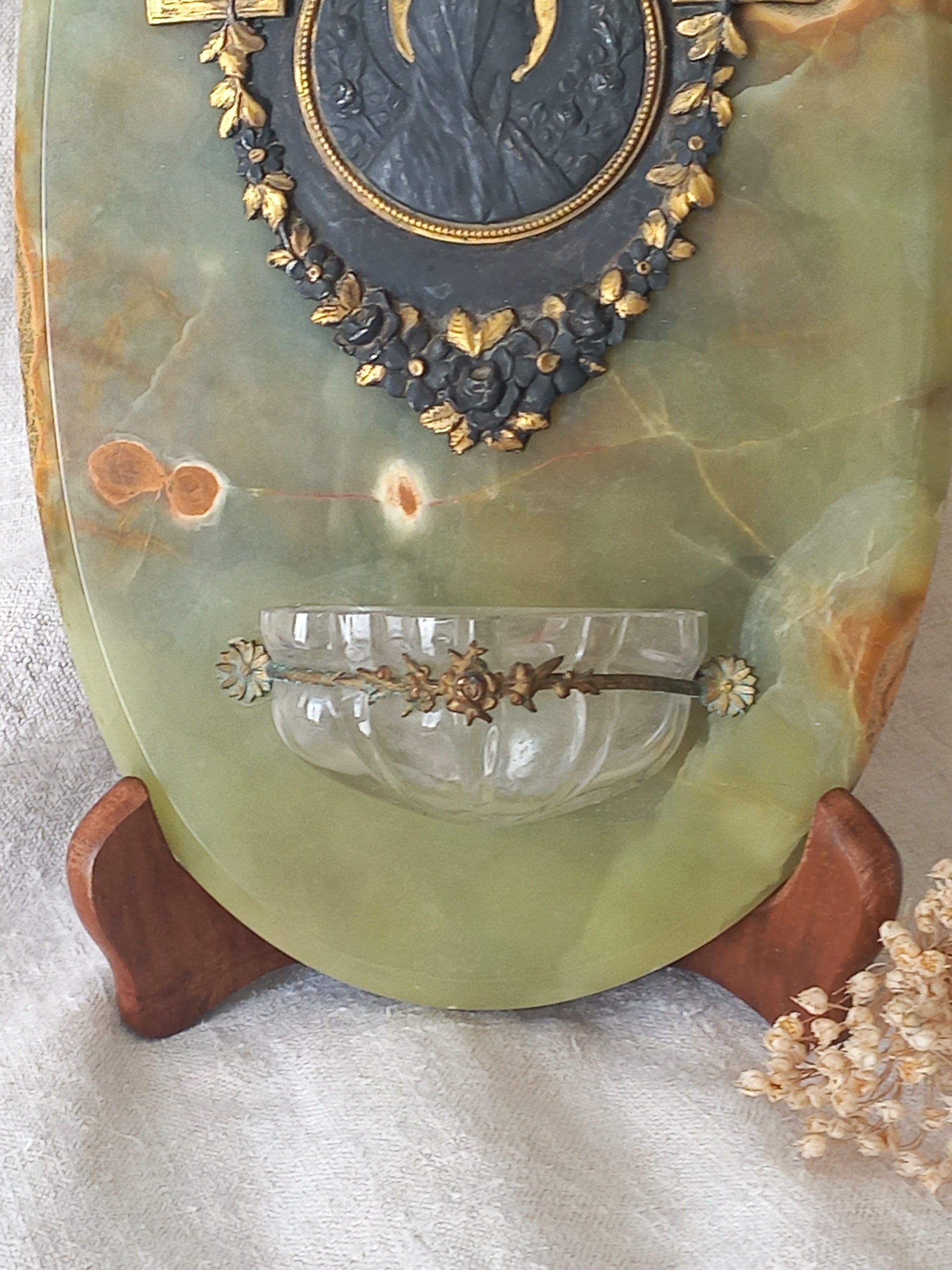 French antique Holy Water font made from onyx with intricate decorative detailing made from metal, a glass water font , and a brass back-plate with a hanging hook.