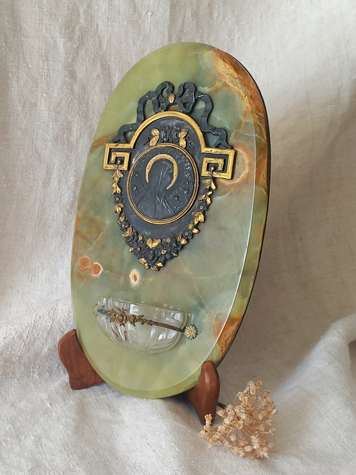 French antique Holy Water font made from onyx with intricate decorative detailing made from metal, a glass water font , and a brass back-plate with a hanging hook.