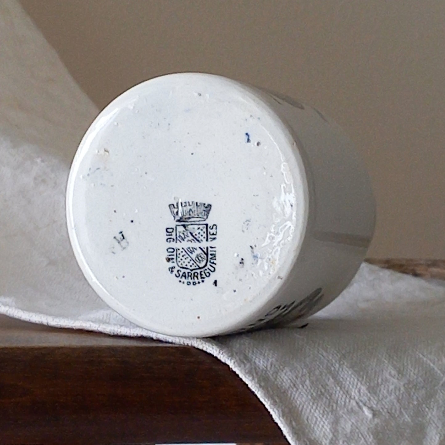 A small antique white ironstone Dijon Grey-Poupon mustard pot made by premier French manufacturer Sarreguemines. These little pots are very collectible and make wonderful pieces of home decor.