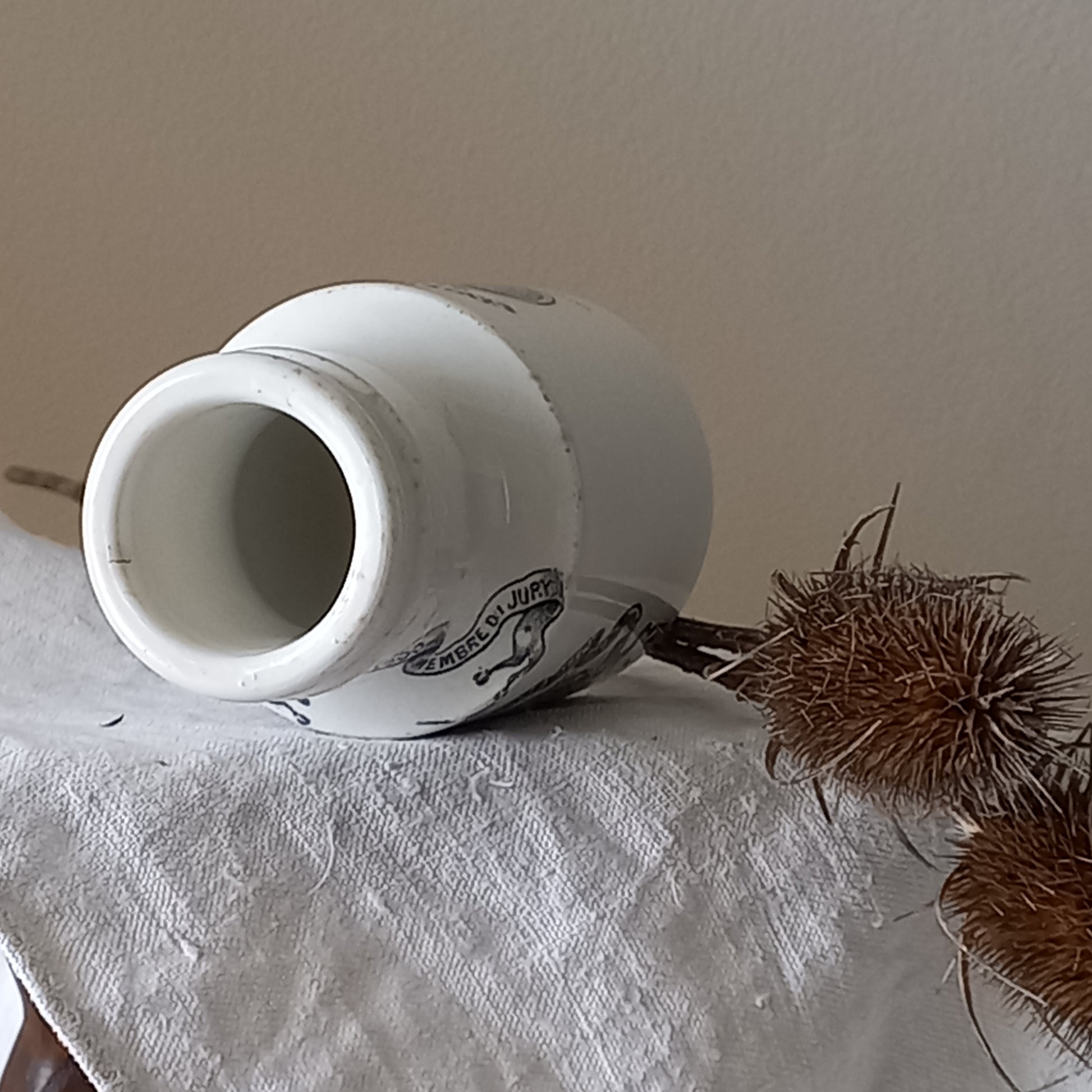 A small antique white ironstone Dijon Grey-Poupon mustard pot made by premier French manufacturer Sarreguemines. These little pots are very collectible and make wonderful pieces of home decor.