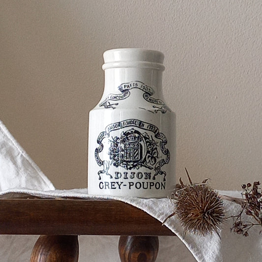 A small antique white ironstone Dijon Grey-Poupon mustard pot made by premier French manufacturer Sarreguemines. These little pots are very collectible and make wonderful pieces of home decor.