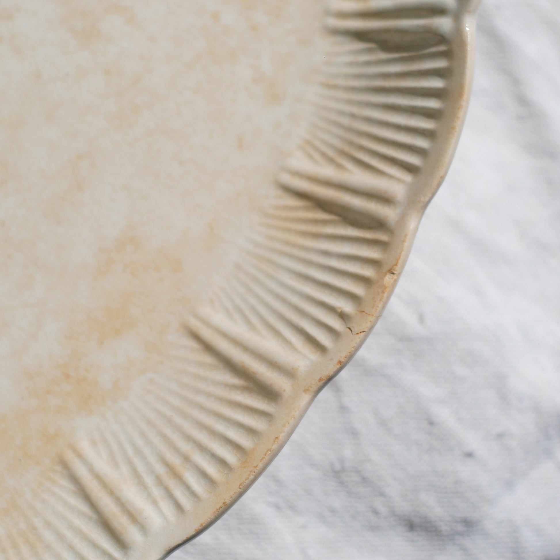 A beautiful pair of French antique ironstone raviers or side plates which over the last century or more have developed a wonderful time-worn and tea-stained finish which make them perfect for shabby chic interior decor. We very rarely come across these little plates lately they're a rare find.