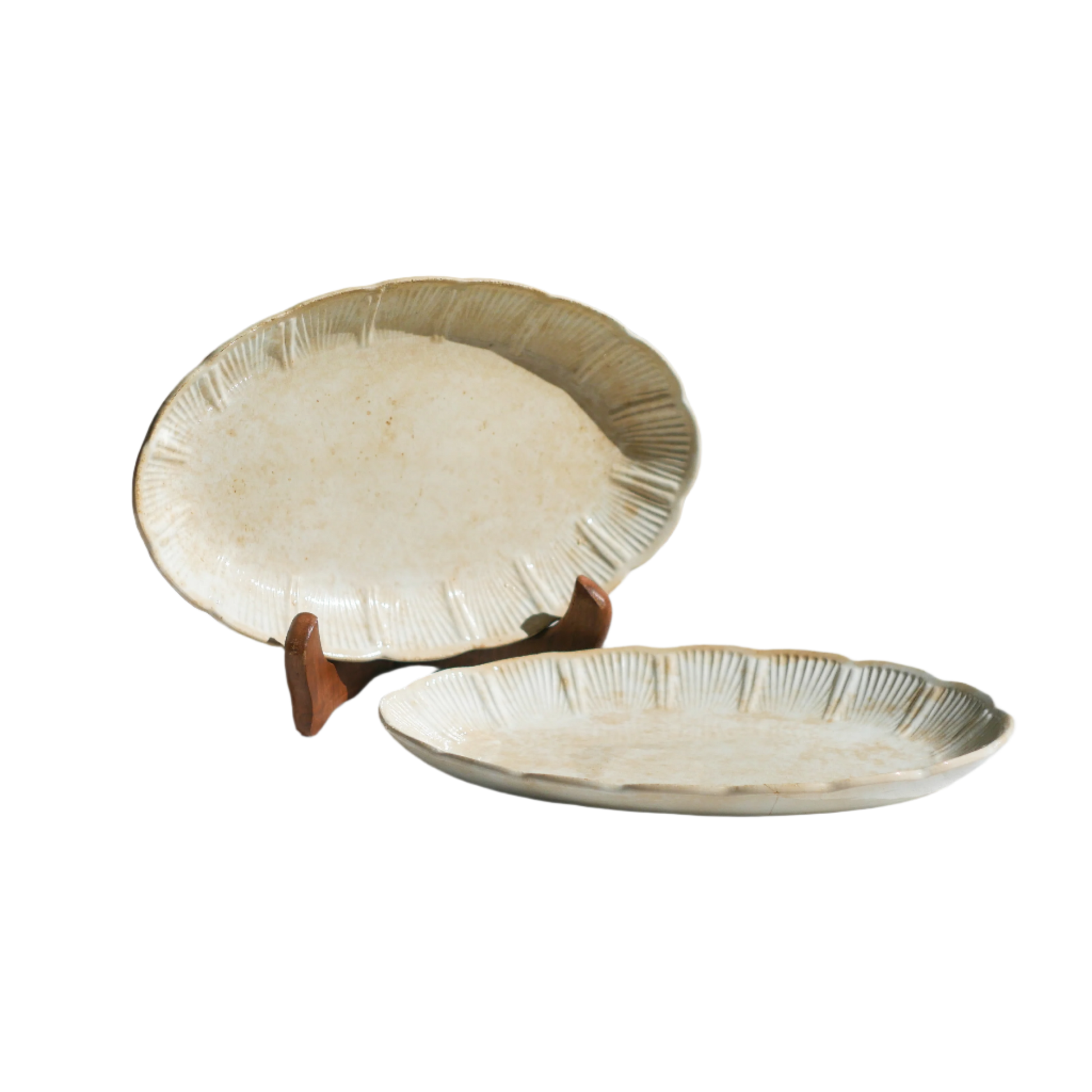 A beautiful pair of French antique ironstone raviers or side plates which over the last century or more have developed a wonderful time-worn and tea-stained finish which make them perfect for shabby chic interior decor. We very rarely come across these little plates lately they're a rare find.