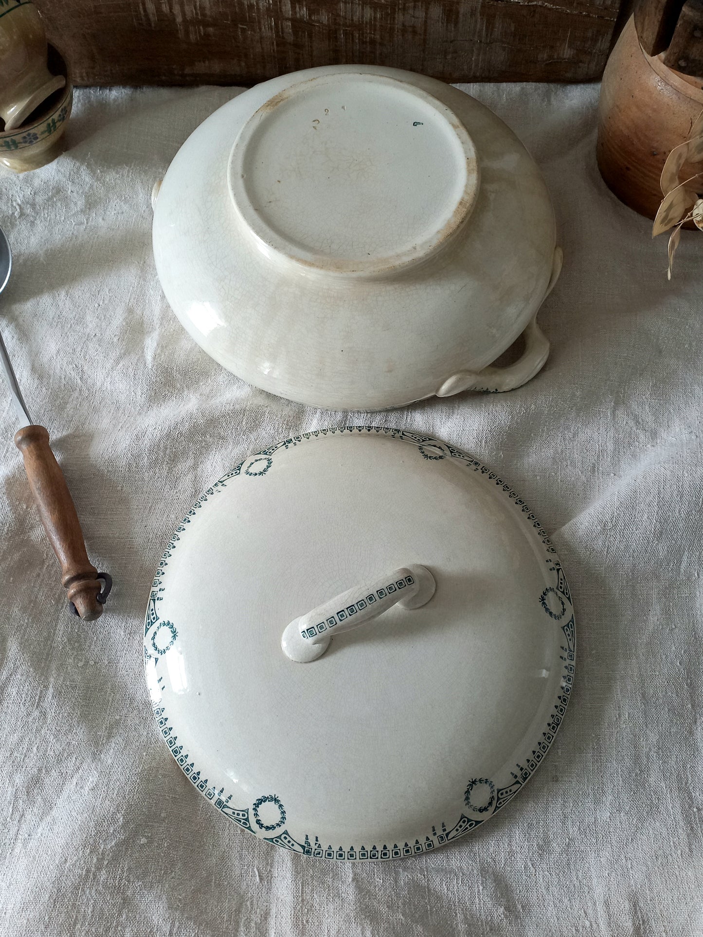 A large French antique white ironstone soup tureen with an attractive teal colour transferware design. Over the many decades this lovely old tureen has developed a time-worn patina with a warm, creamy white finish.

